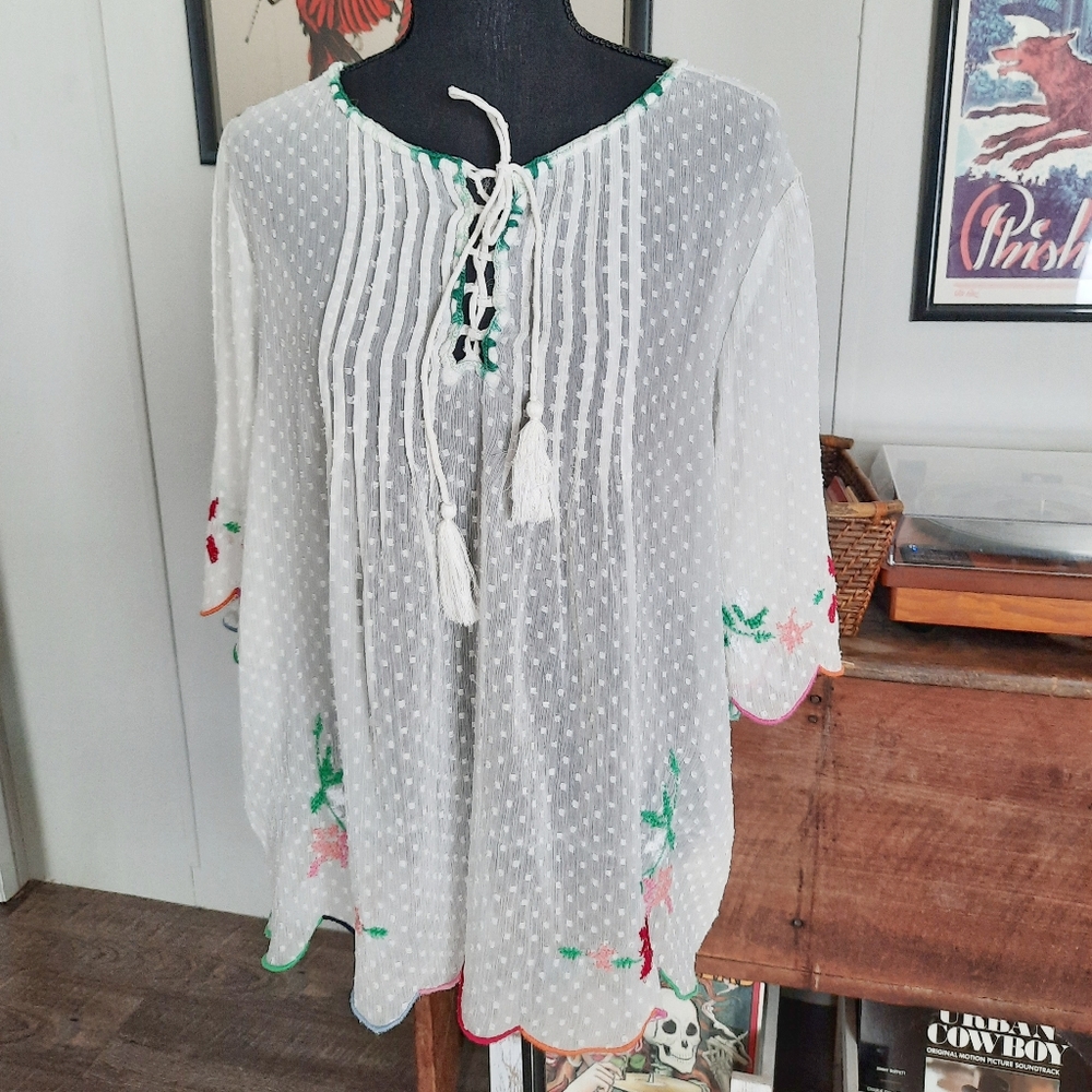 Sheer white top with floral embroidery